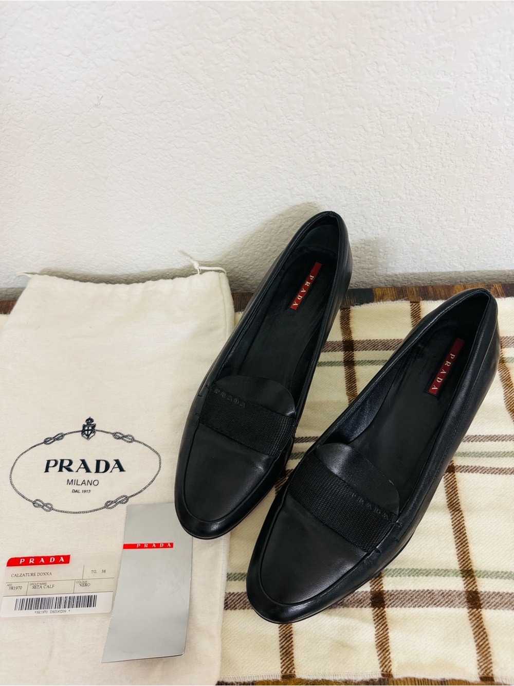 Prada • Linea Rossa Leather Slip-On Loafers in Nero (Black) with Kitten Heel